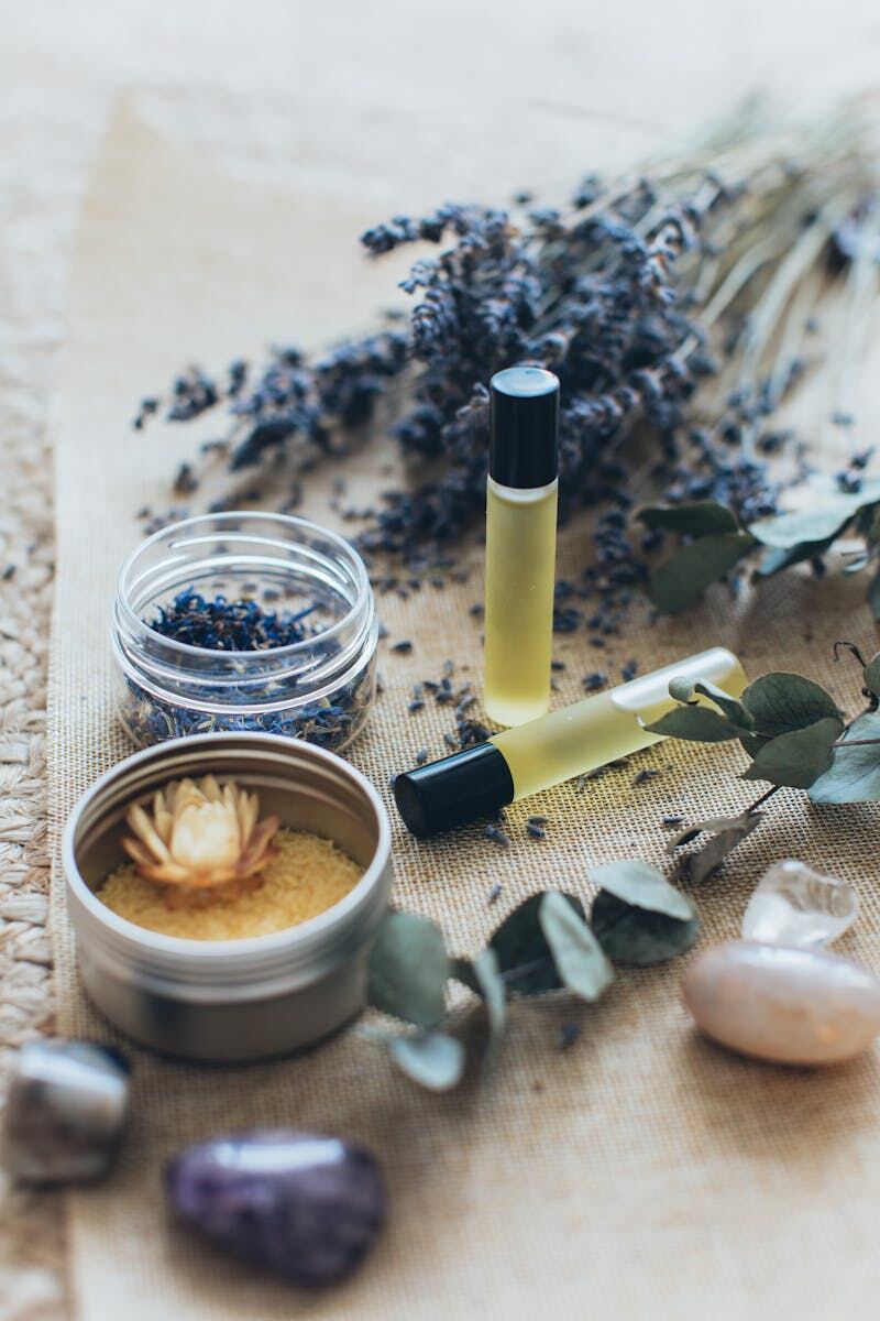 Lavender bunches, eucalyptus, and essential oil rollers — natural wellness ingredients used in Fragrance of Heaven blends